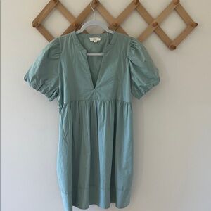 Teal knee length puff sleeved Dress LN. Size S
